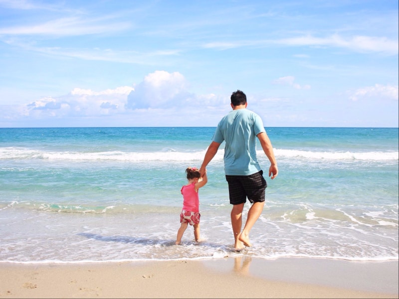 Father And Some On The Beach